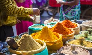 colorful pyramids of spices at market