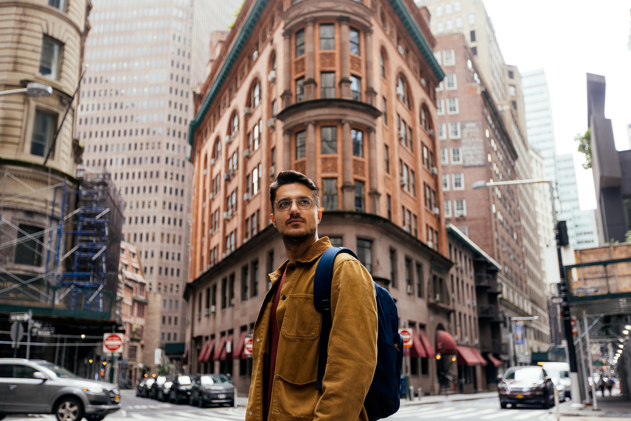 person amidst city buildings