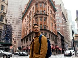 person amidst city buildings