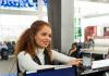 person at check-in counter