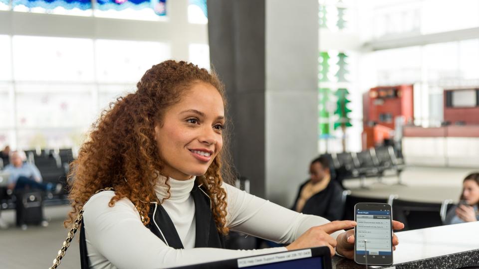 person at check-in counter